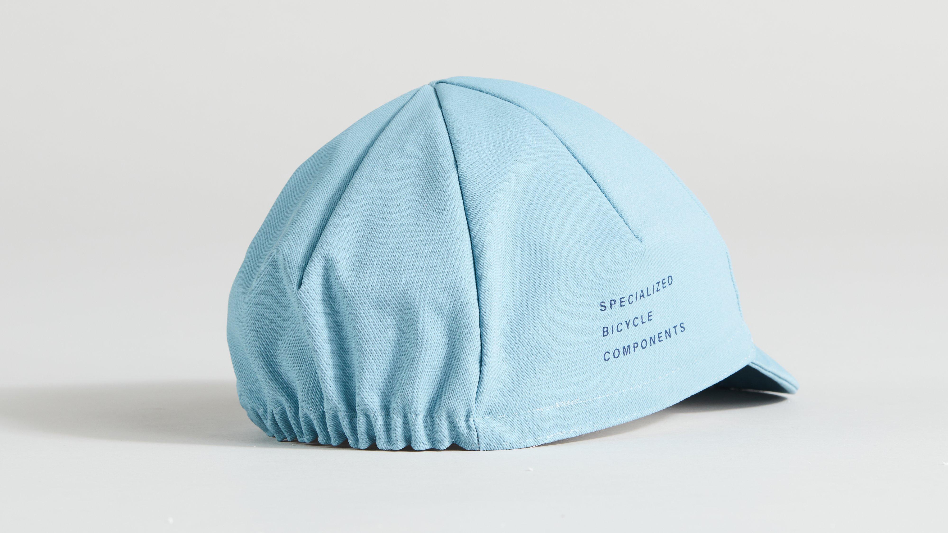 64822-280_APP_COTTON-CYCLING-CAP-ARCTBLU-OSFA_BACK?$scom-pdp-product-image-xl$\u0026fmt=webp