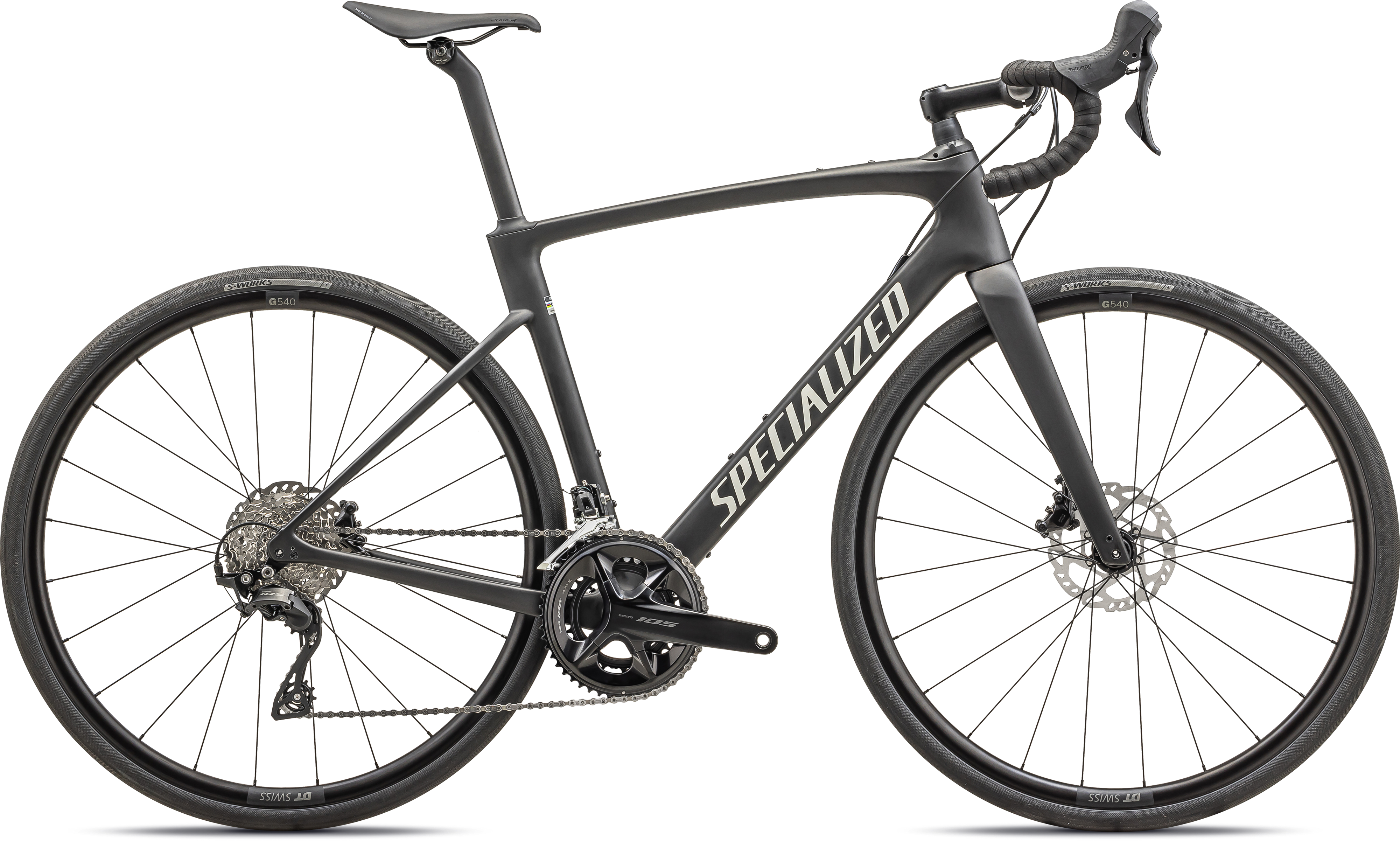 Brown Specialized Roubaix Sport carbon endurance road bike with Shimano 105 groupset and hydraulic disc brakes.