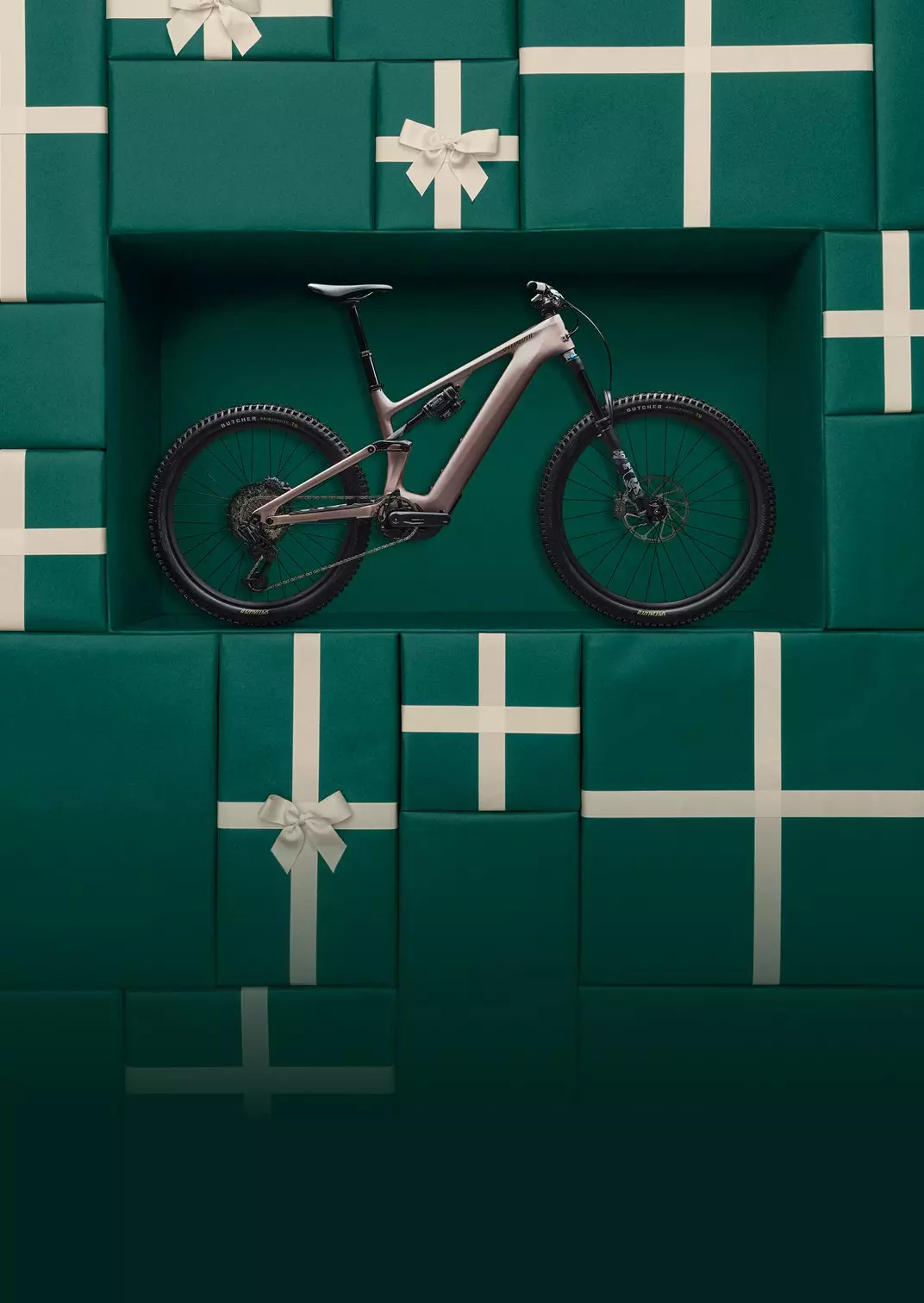 Bike set into a background of wrapped gifts.